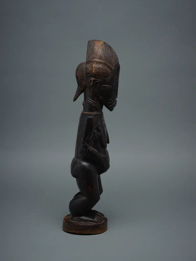 A Baule carved wooden female figure - Ivory Coast - Africa, Image 1++